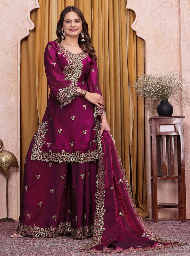 Wine sequence embroidered and boring work fendy silk stitched salwar kameez