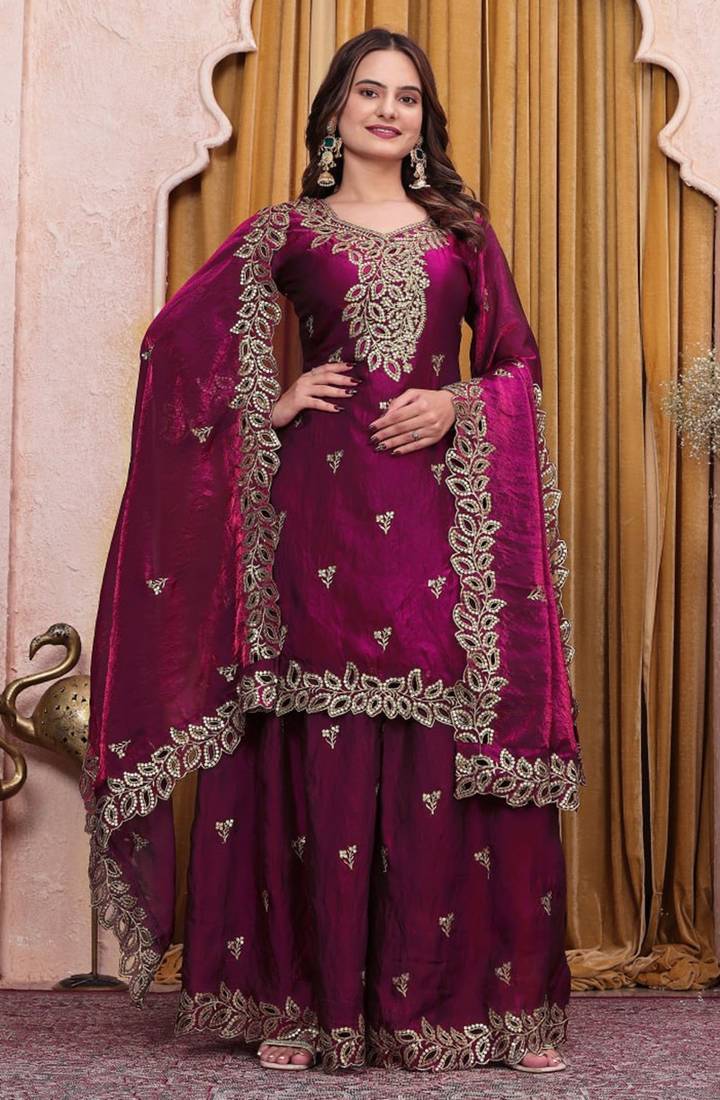 Wine sequence embroidered and boring work fendy silk stitched salwar kameez