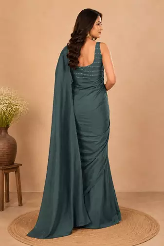 women   s turquoise designer embroidered blouse party wear & festive saree