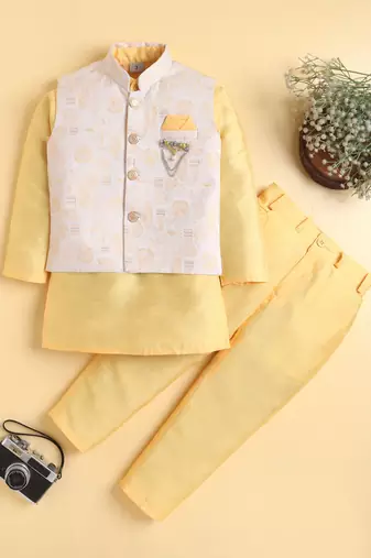 Boys yellow cotton blend kurta pyjama set with jacquard leaf pattern waistcoat