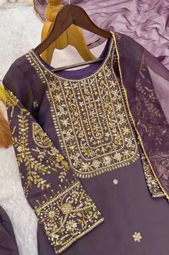 mauve color fancy beads and embroidery and sequence work and ready maid lace border silk blend kurti set