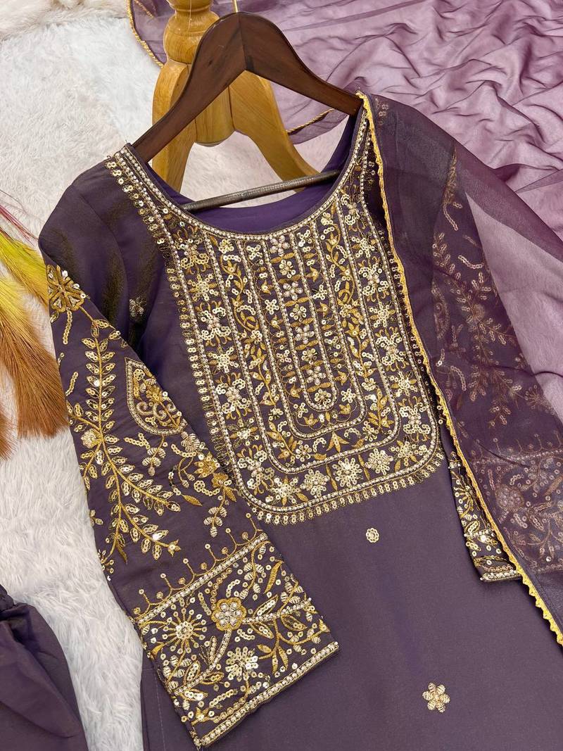 mauve color fancy beads and embroidery and sequence work and ready maid lace border silk blend kurti set