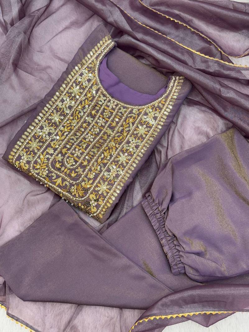 mauve color fancy beads and embroidery and sequence work and ready maid lace border silk blend kurti set