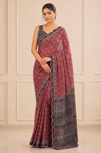 maroon heavy silk blend mirror work saree