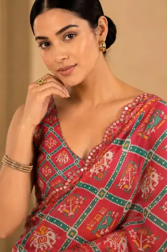 coral printed silk blend mirror lace saree
