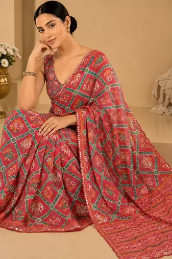 coral printed silk blend mirror lace saree