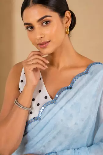 sky blue printed silk blend mirror lace saree