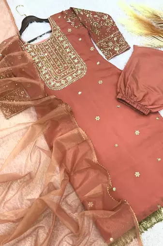 peach color fancy beads and embroidery and sequence work and ready maid lace border silk blend kurti set