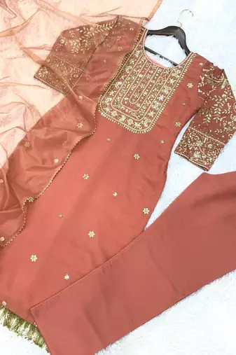 peach color fancy beads and embroidery and sequence work and ready maid lace border silk blend kurti set