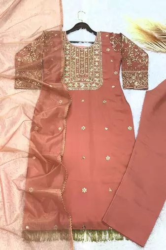 peach color fancy beads and embroidery and sequence work and ready maid lace border silk blend kurti set