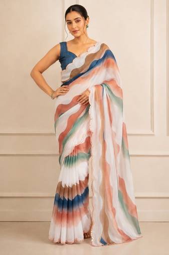 white heavy silk blend mirror work saree