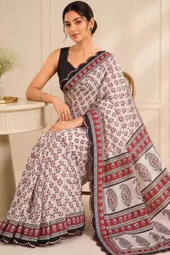 white heavy silk blend mirror work saree