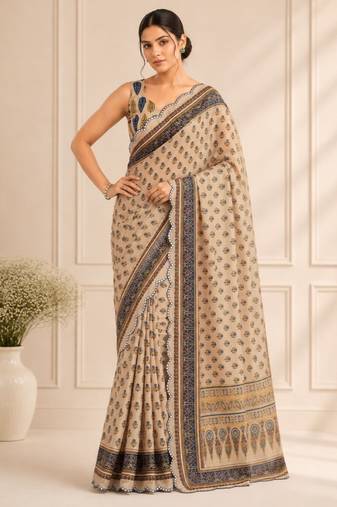 beige heavy silk blend mirror work saree