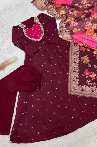 maroon color  beautiful thread embroidery sequins with codding work silk blend gown set
