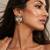 Pearl earrings with oxidized gold plating
