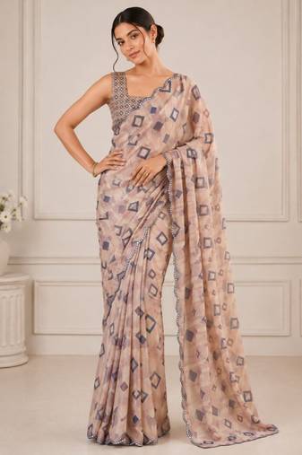 beige heavy silk blend mirror work saree