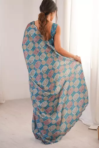 teal heavy silk blend mirror work saree