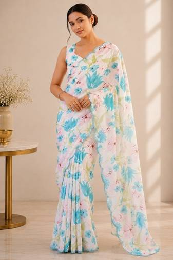 white heavy silk blend mirror work saree