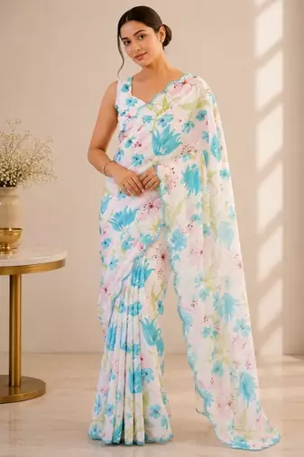 white heavy silk blend mirror work saree