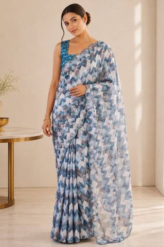 aqua blue heavy silk blend mirror work saree