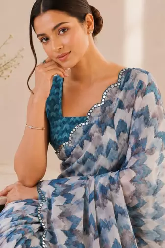aqua blue heavy silk blend mirror work saree