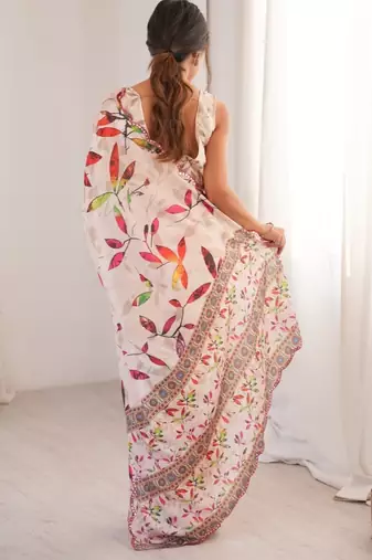cream heavy silk blend mirror work saree