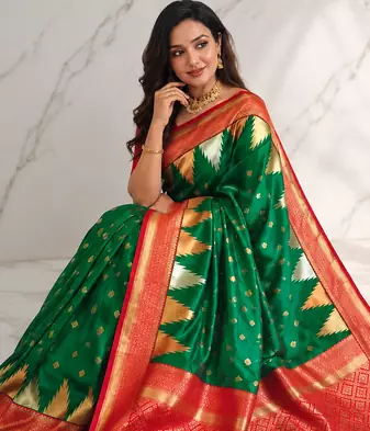 emerald green color zari and weaving design all over with rich pallu kanchi silk blend saree