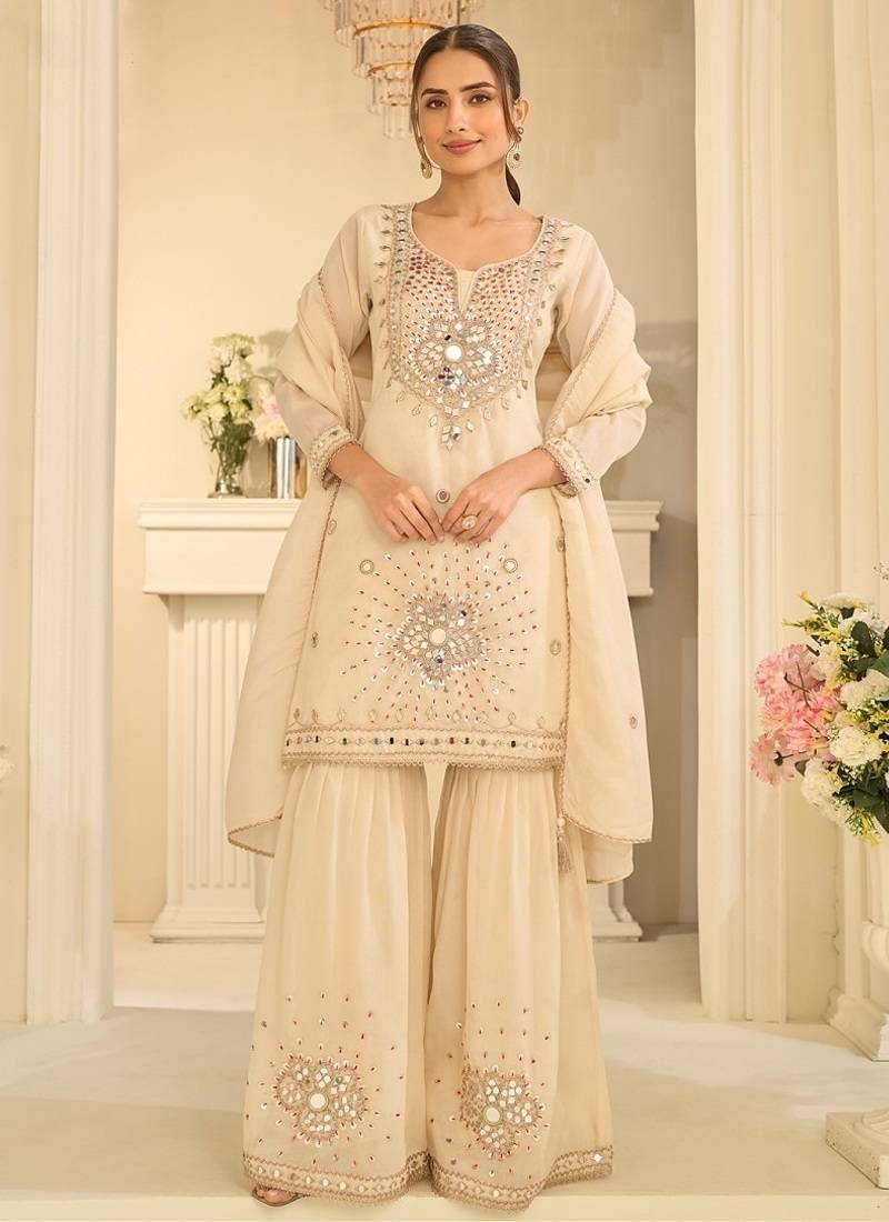 Cream silk blend with real mirror with sequence hand work kurta sharara with dupatta