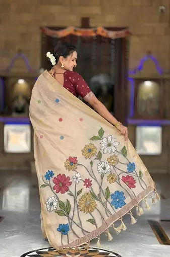Cream cotton silk saree with colorful floral weaving pallu with blouse