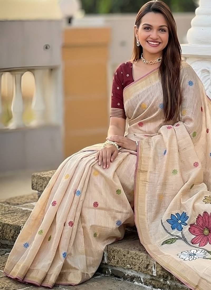 Cream cotton silk saree with colorful floral weaving pallu with blouse
