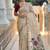 Cream cotton silk saree with colorful floral weaving pallu with blouse