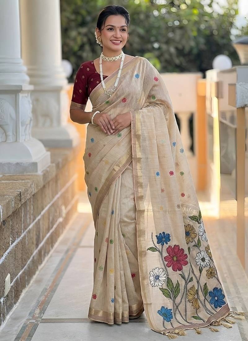 Cream cotton silk saree with colorful floral weaving pallu with blouse