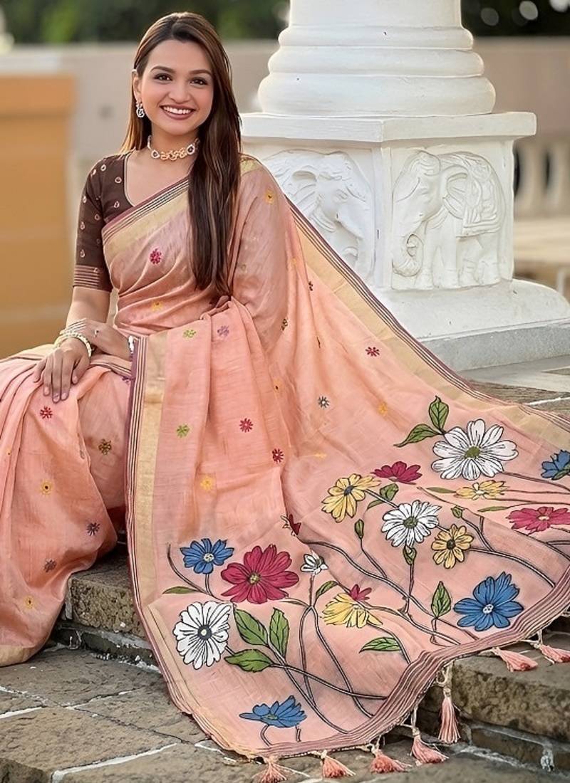 Peach cotton silk saree with colorful floral weaving pallu with blouse