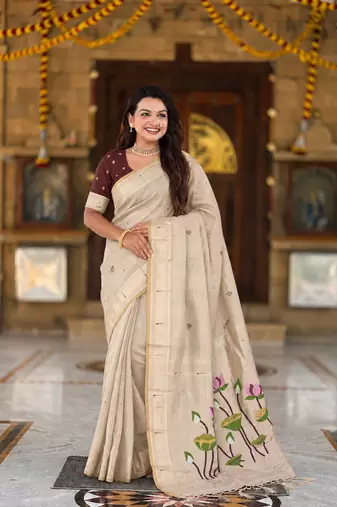 Cream cotton silk saree with colorful floral weaving pallu with blouse