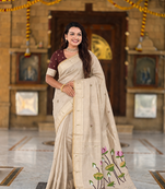 Cream cotton silk saree with colorful floral weaving pallu with blouse