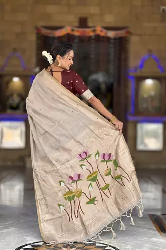 Cream cotton silk saree with colorful floral weaving pallu with blouse