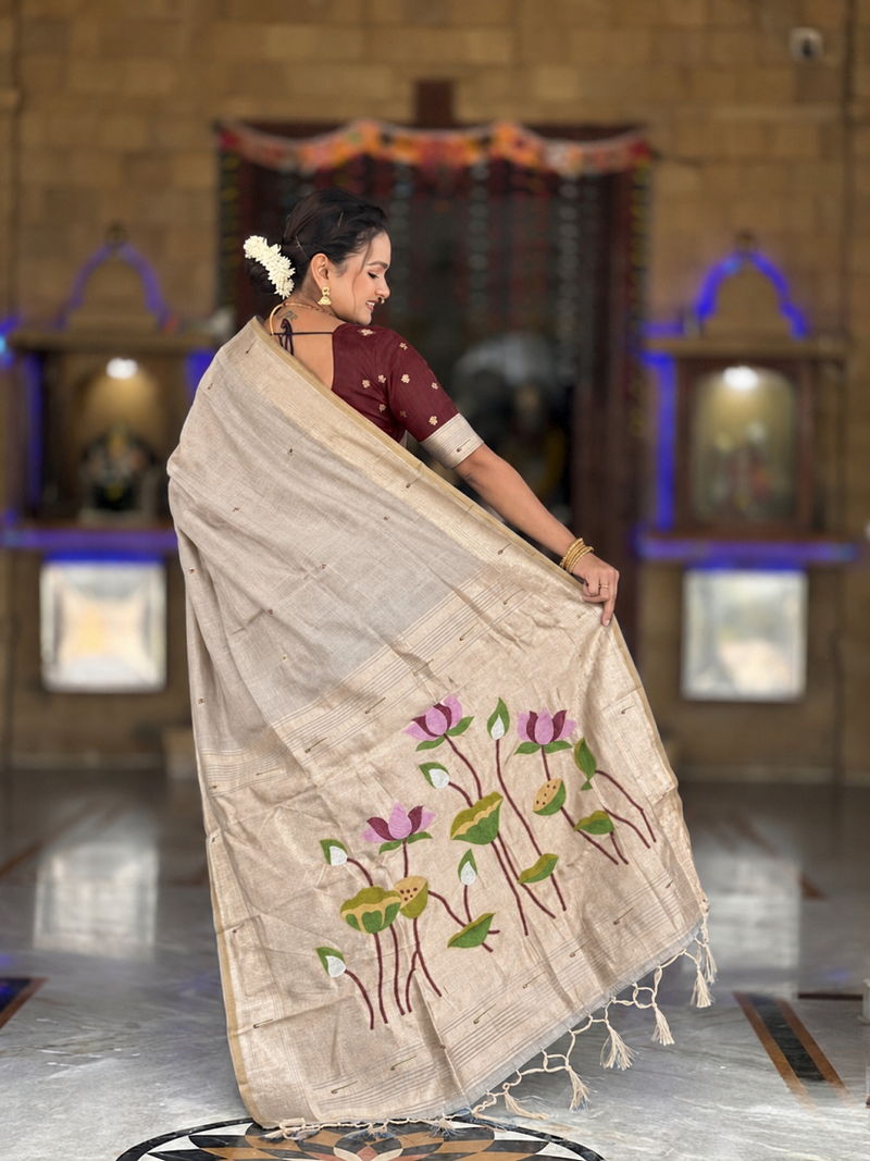 Cream cotton silk saree with colorful floral weaving pallu with blouse