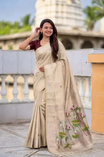 Cream cotton silk saree with colorful floral weaving pallu with blouse