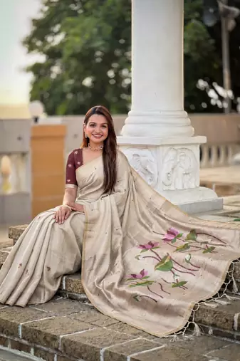 Cream cotton silk saree with colorful floral weaving pallu with blouse