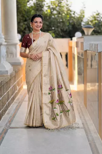 Cream cotton silk saree with colorful floral weaving pallu with blouse