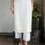 Off-white chikankari kurta set with georgette pants & dupatta, stitched