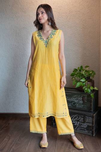 Yellow chanderi mirrorwork kurta set with pants, stitched
