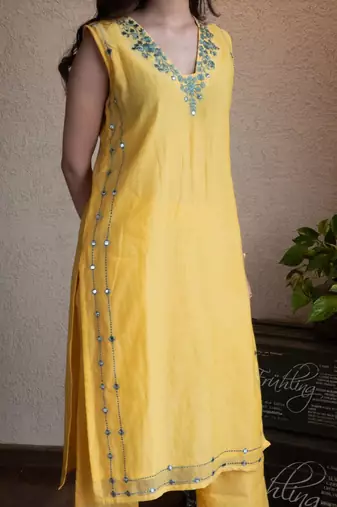 Yellow chanderi mirrorwork kurta set with pants, stitched