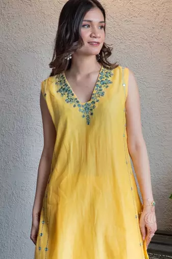 Yellow chanderi mirrorwork kurta set with pants, stitched