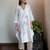 Off-white chanderi floral applique kurta set with pants, stitched