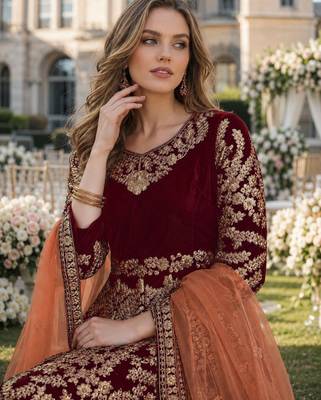 maroon embroidered velvet semi stitched patiyala suit 2