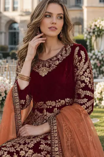maroon embroidered velvet semi stitched patiyala suit