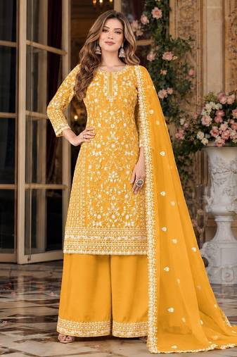 yellow embroidered net semi stitched plazzo suit