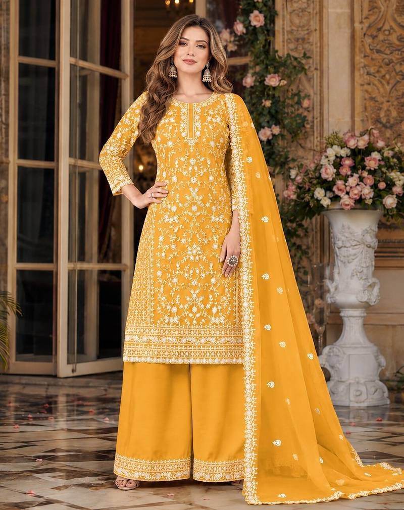 yellow embroidered net semi stitched plazzo suit