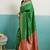 green banarasi silk blend zari woven with jaal saree with blouse